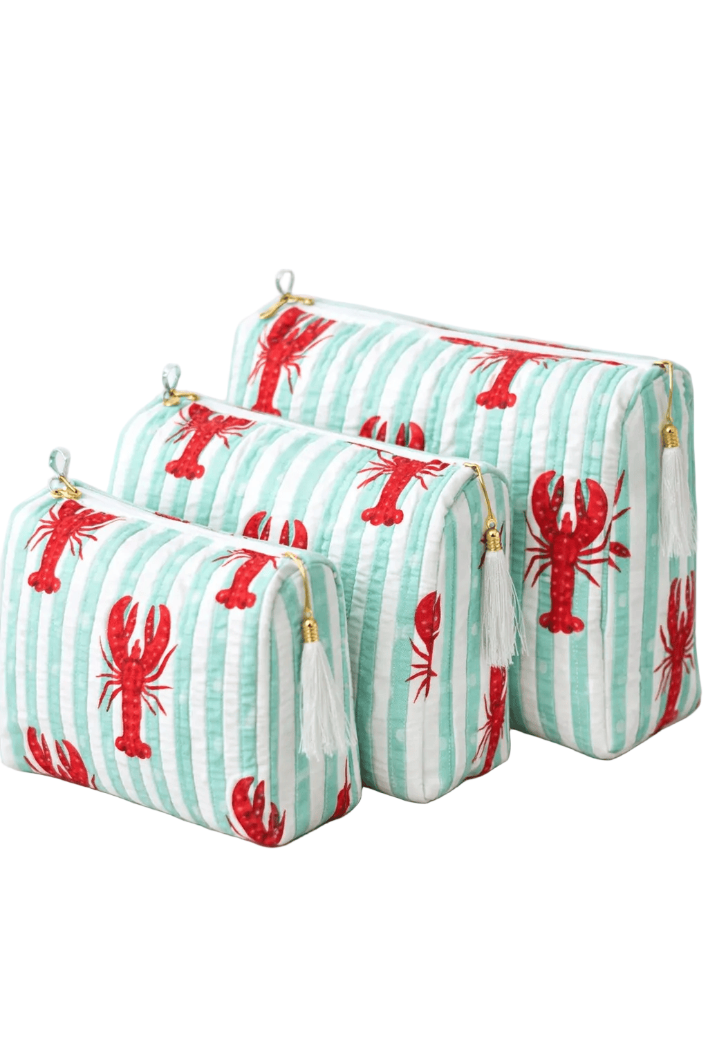 The Striped Lobster Travel Set showing three cotton pouches with hand-block-printed striped lobster print