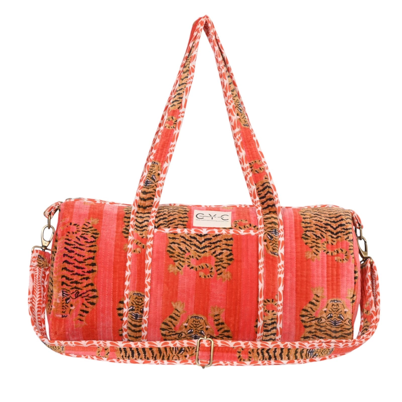 Open view of The Tibetan Tiger Velvet Weekender showing the lined interior and inside zipper pocket