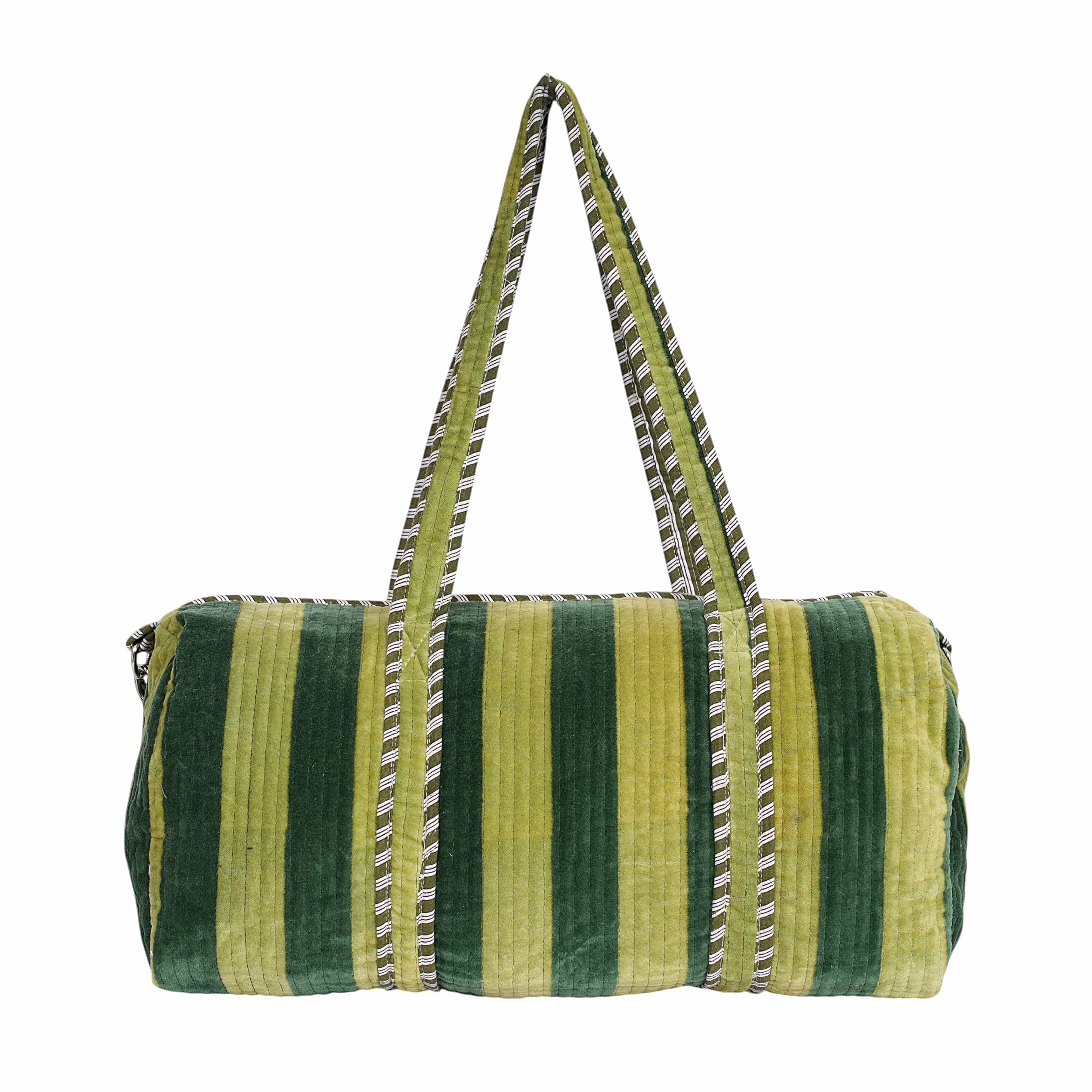 Detail of the rich velvet pile with saturated colour banding running across the body of the bag