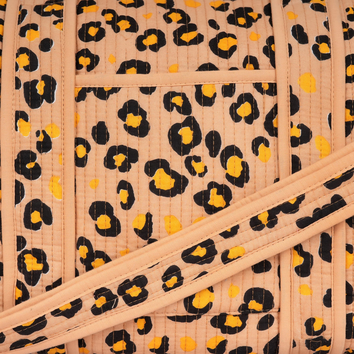 The Leopard Cotton Weekender — handmade cotton weekend bag with our signature leopard print, ethically made in Rajasthan, India