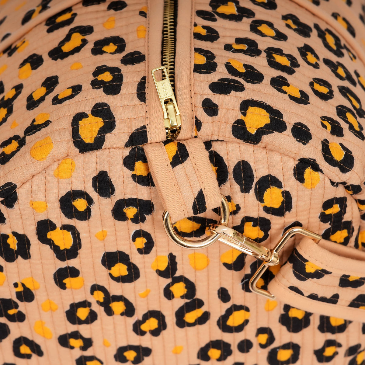 The Leopard Cotton Weekender — handmade cotton weekend bag with our signature leopard print, ethically made in Rajasthan, India
