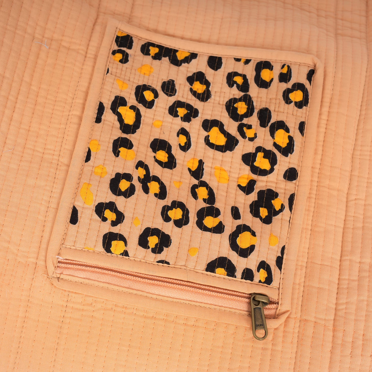 The Leopard Cotton Weekender — handmade cotton weekend bag with our signature leopard print, ethically made in Rajasthan, India