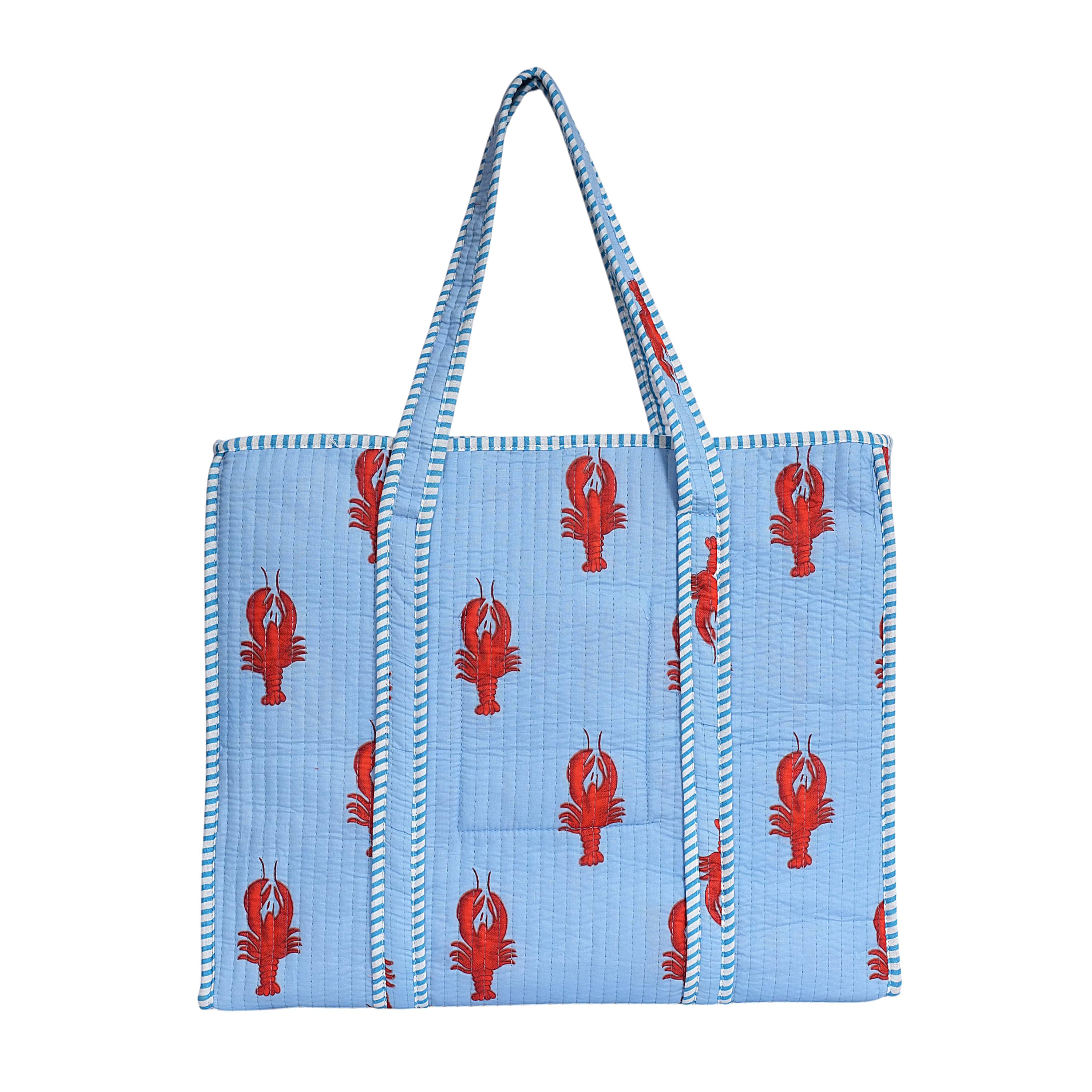 The Lobster Tote in cream cotton with the hand-block-printed red lobster motif as the focal print