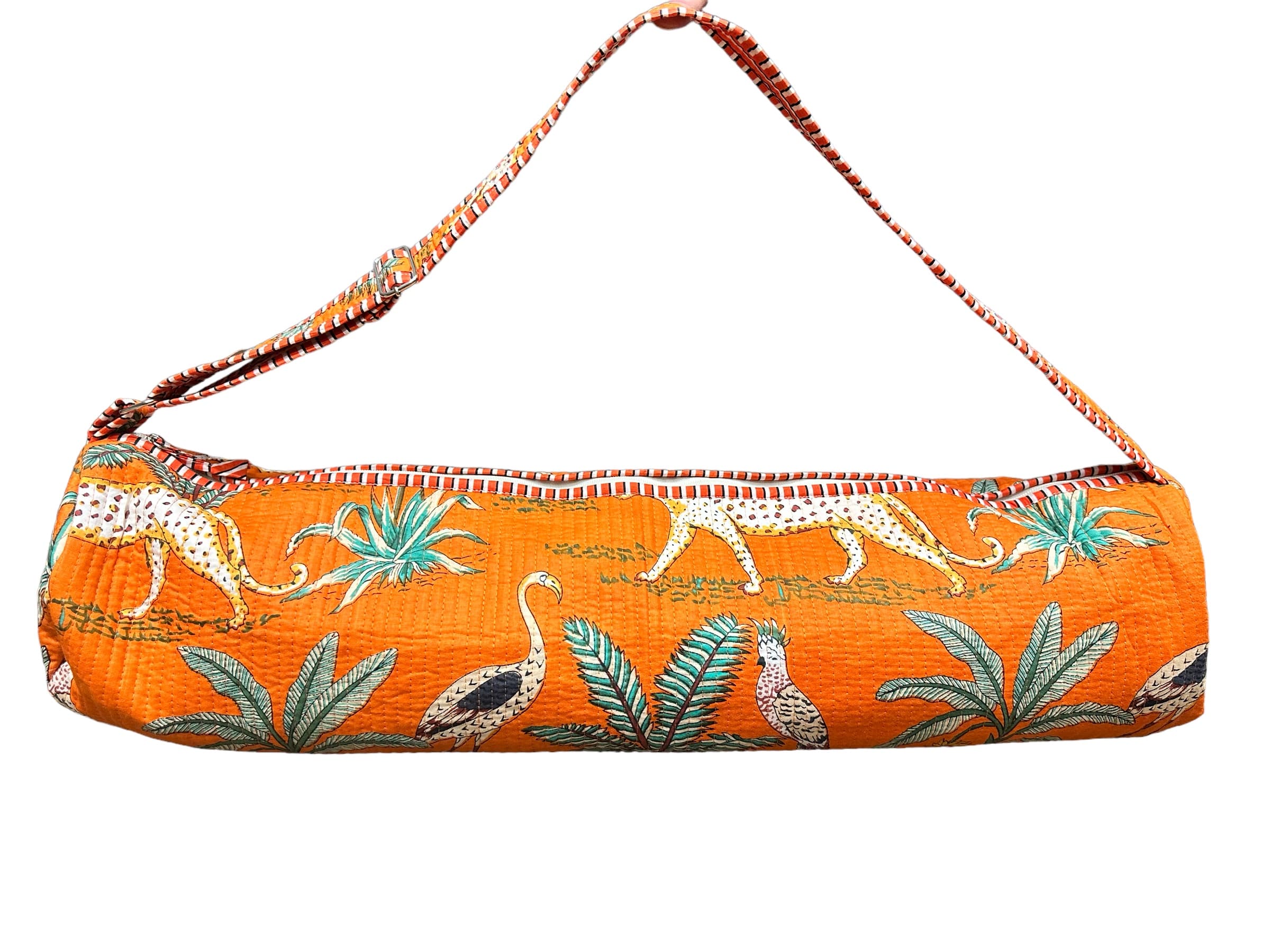 Open view of The Jungle Yoga Bag showing the drawstring top and mat capacity