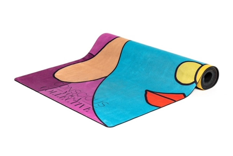 Rolled up Pablo Picasso inspired Buddha Yoga Mat with yellow, pink, blue, beige, red, purple