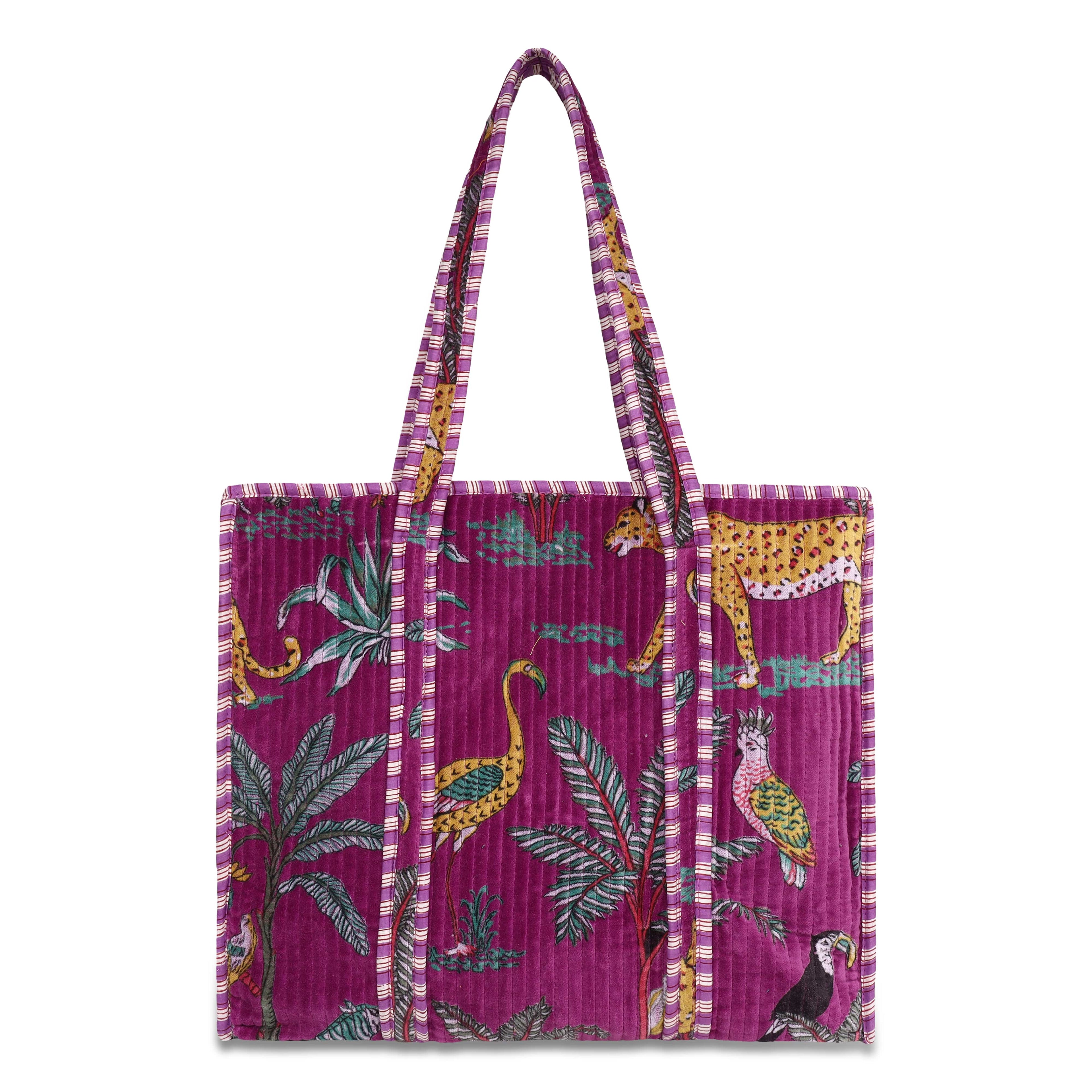 Open view of The Jungle Tote in Velvet showing the velvet-lined interior with space for a laptop and weekly essentials