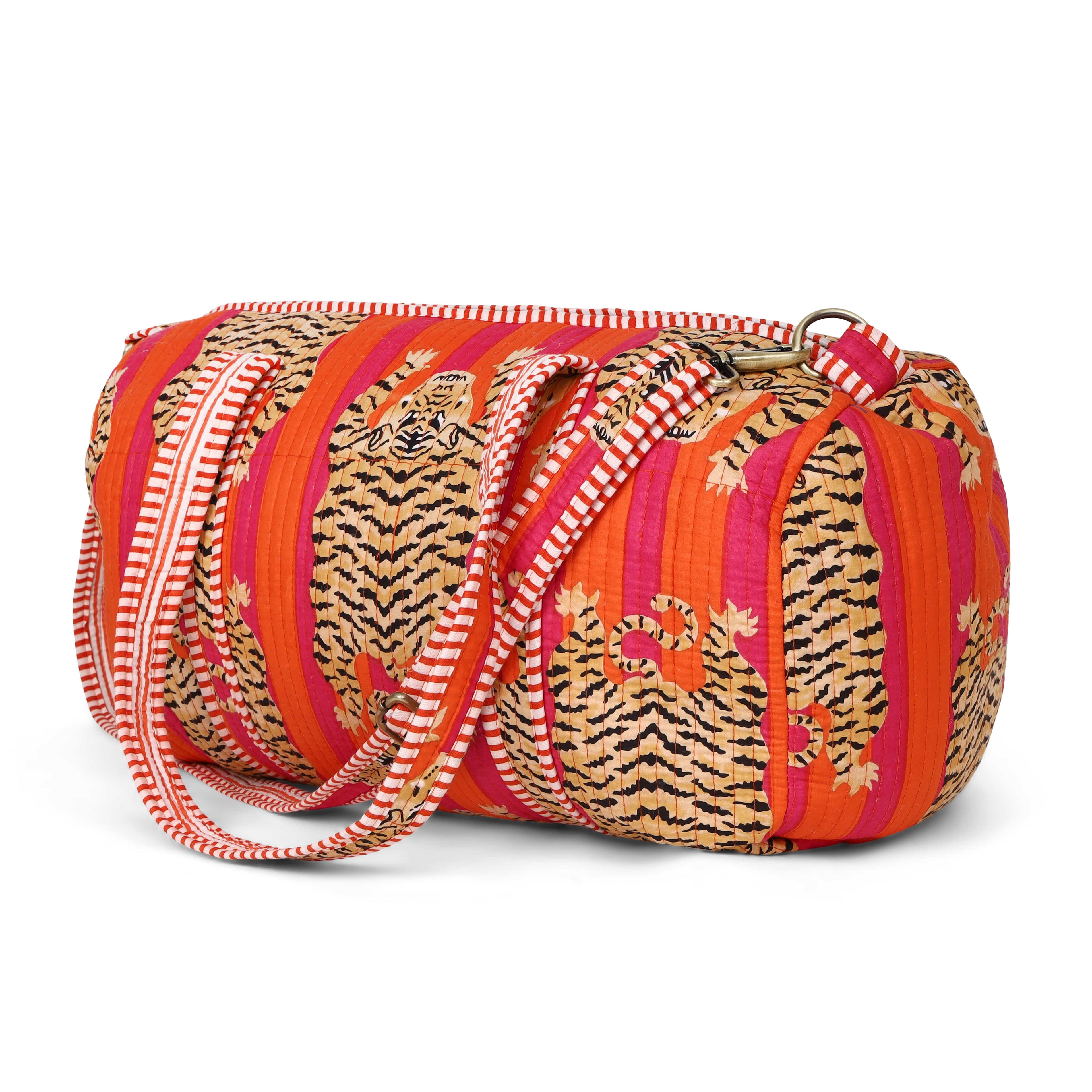 Front view of The Tibetan Tiger Weekender in cream cotton with the hand-block-printed Tibetan tiger motif filling the body