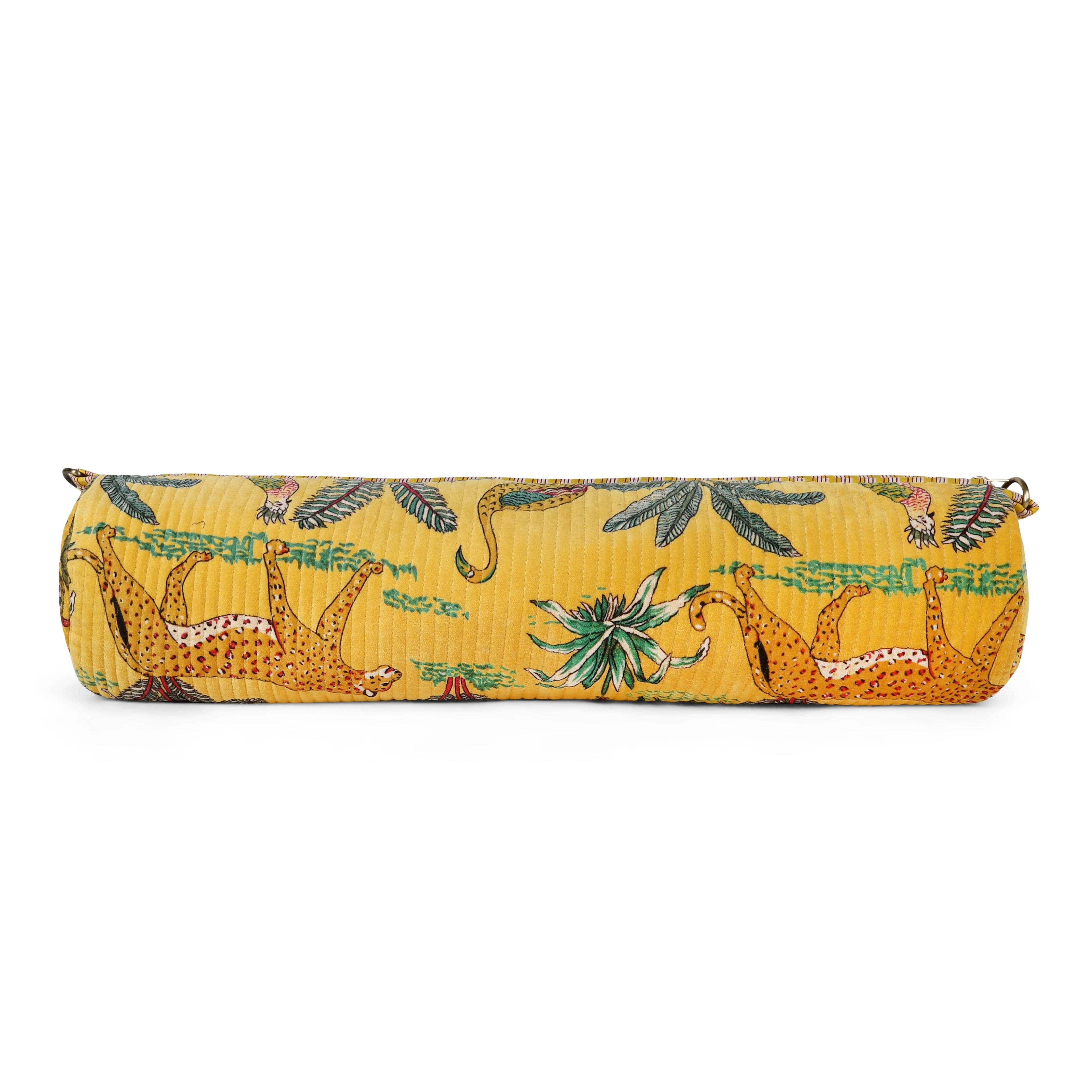 Detail of the hand-block-printed jungle motif on plush velvet, showing the depth of the dye