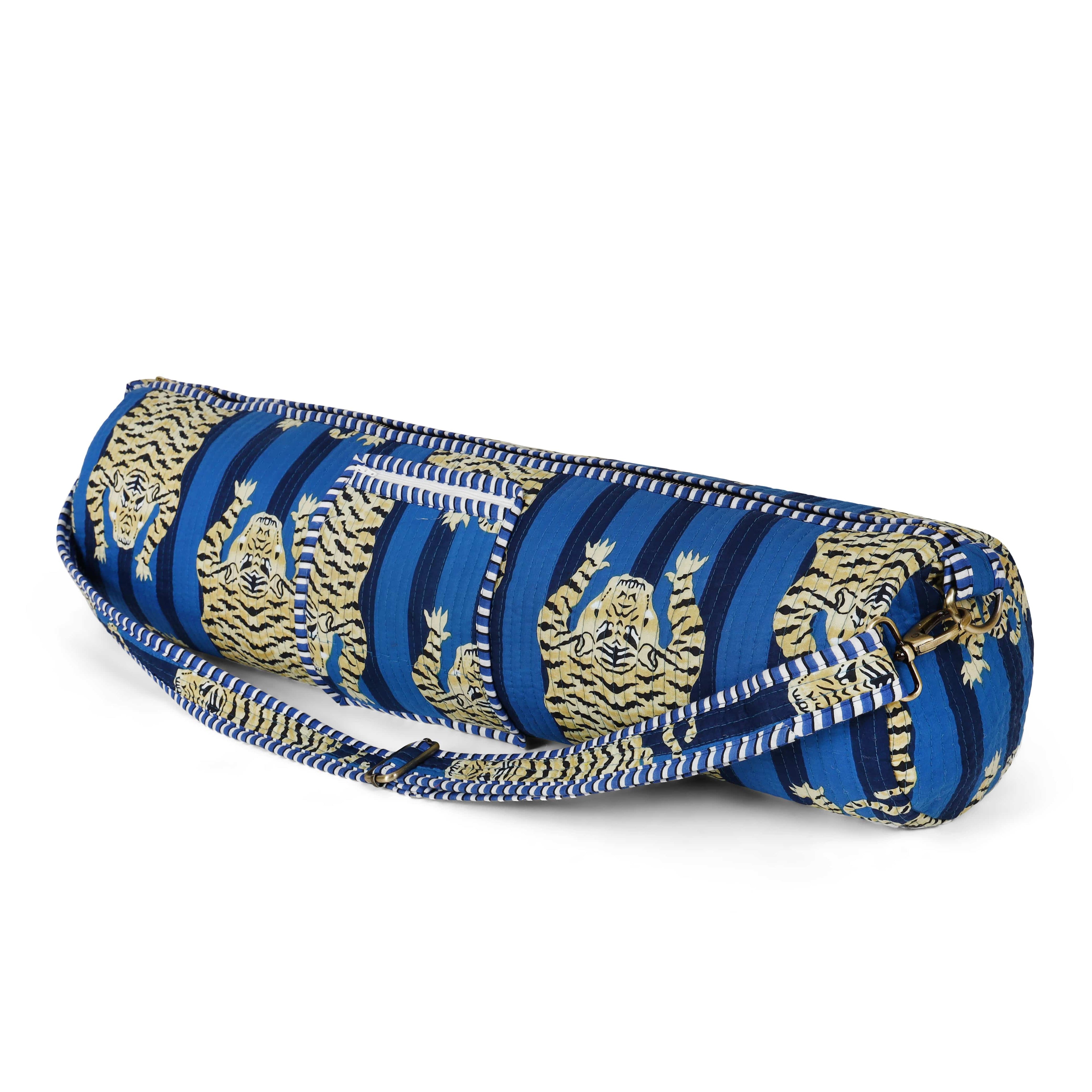 Open view of The Tibetan Tiger Yoga Bag showing the drawstring closure and mat capacity