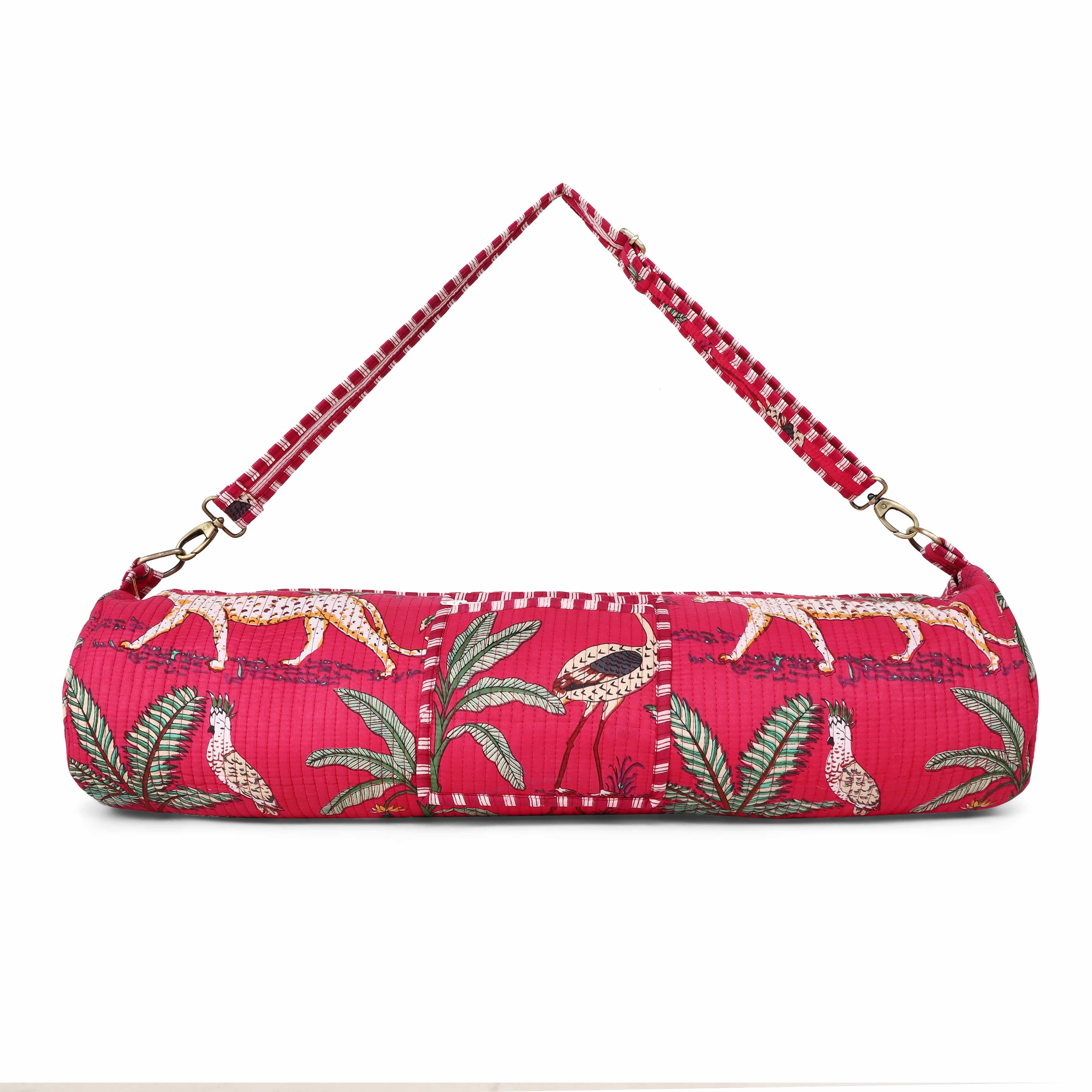 Front view of The Jungle Yoga Bag in cream cotton with the hand-block-printed jungle print including parrots and palms