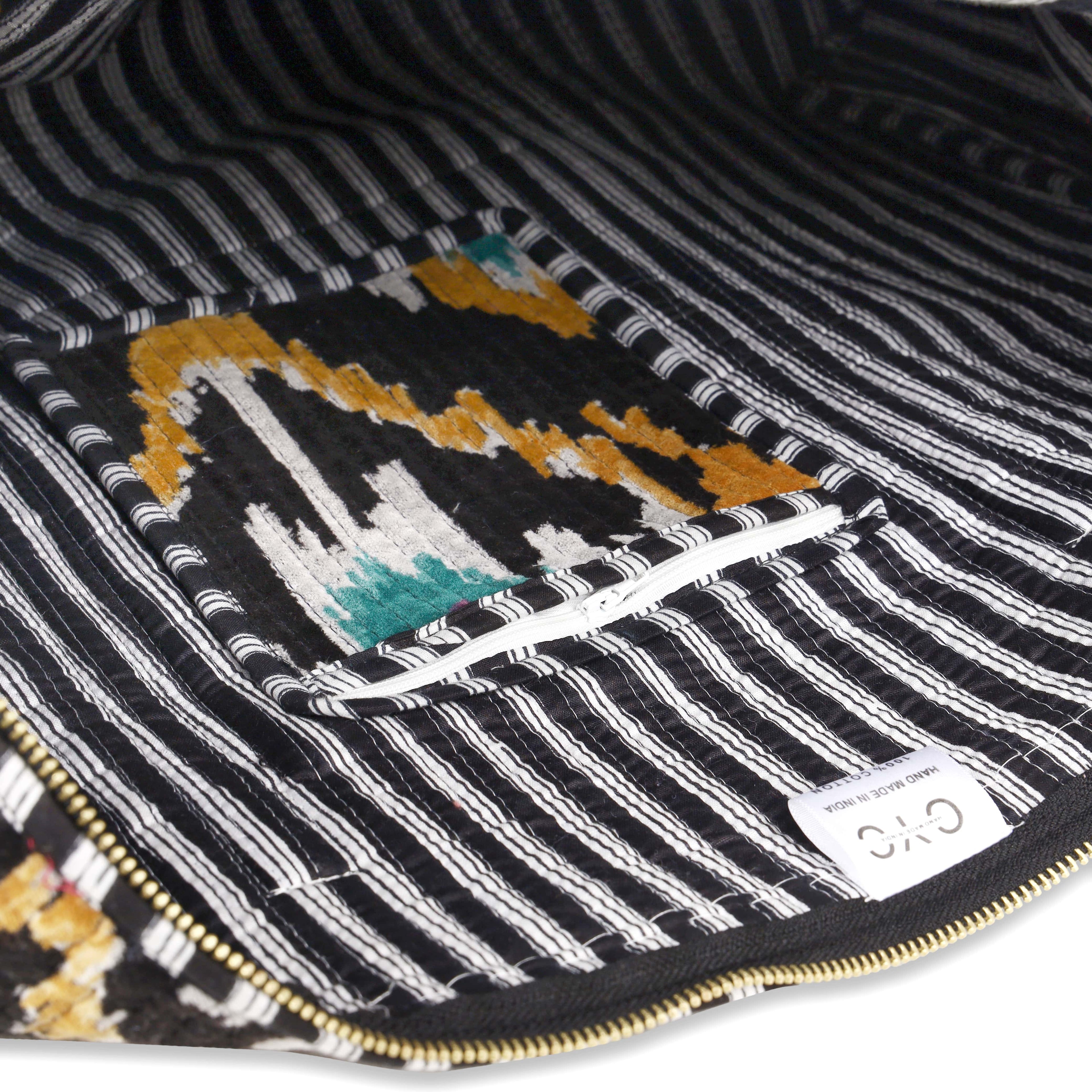 The Ikat Velvet Weekender — handmade quilted velvet weekender bag, ethically made in Rajasthan, India