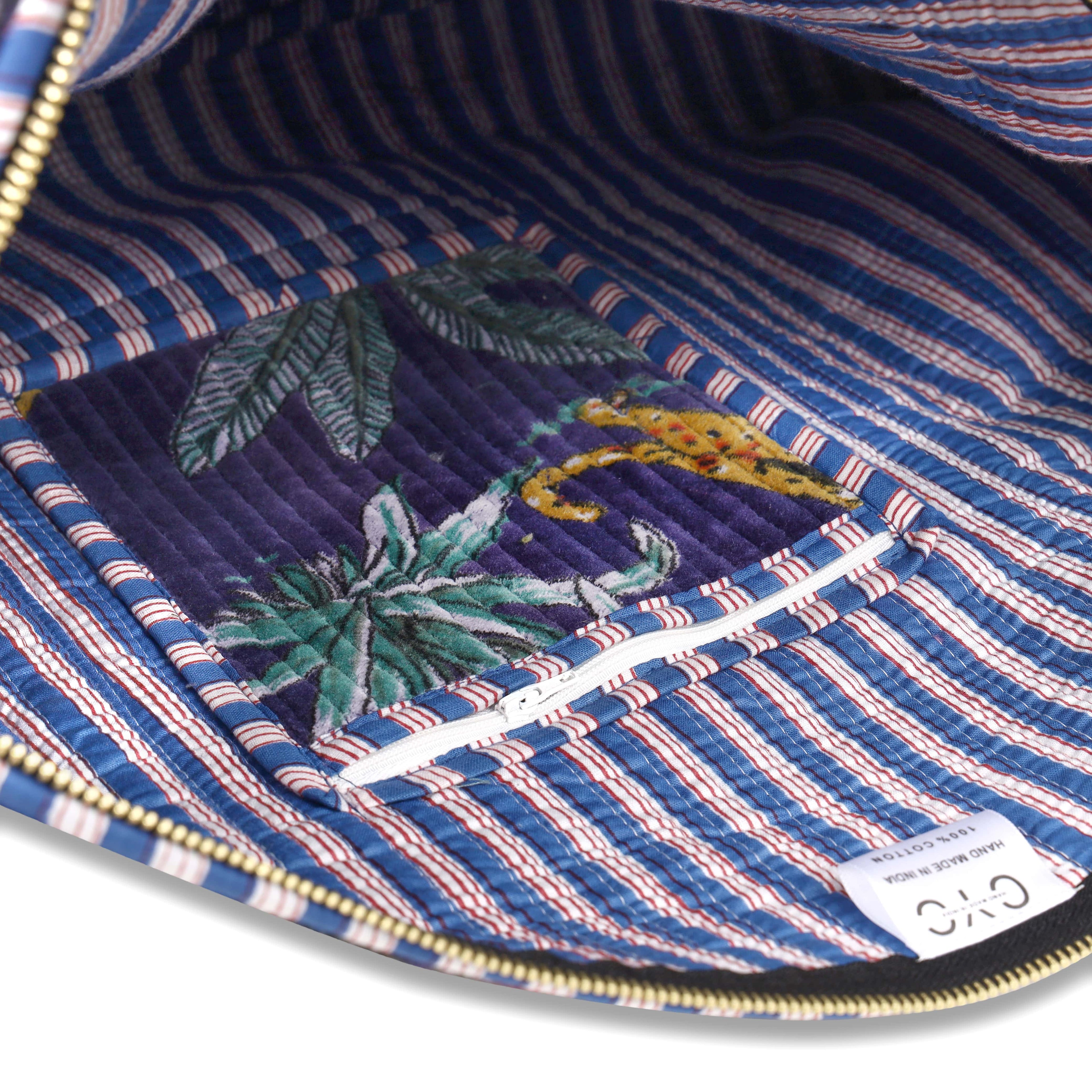 Close-up of The Jungle Velvet Weekender&
