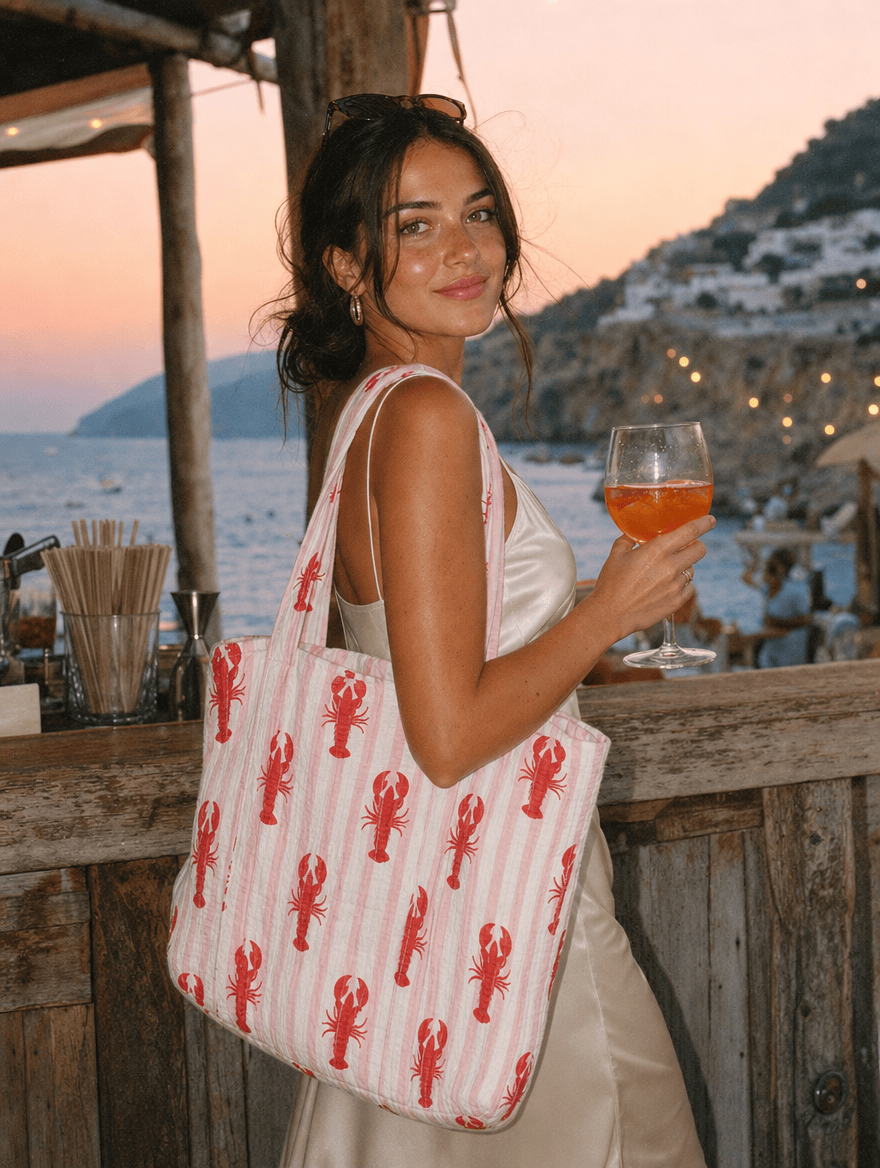 Italian holiday lifestyle scene with The Striped Lobster Tote — handmade cotton from Conscious Yoga Collective, Mediterranean summer mood