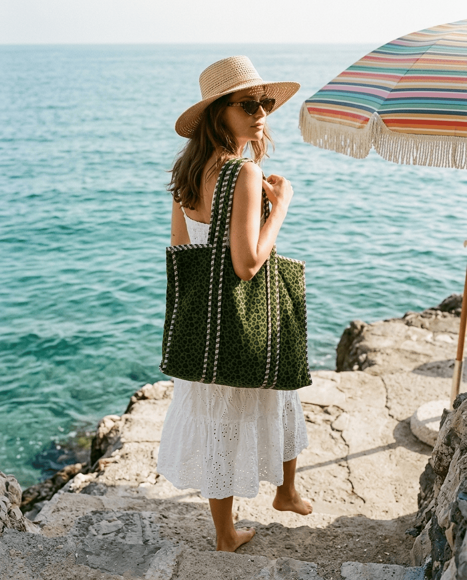 Stone beach steps descent with the Velvet Leopard Tote in Green over shoulder — handmade in Rajasthan by Conscious Yoga Collective