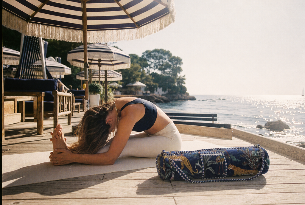 A rolled yoga mat beside a handmade cotton yoga mat bag — the CYC guide to whether your mat will fit.