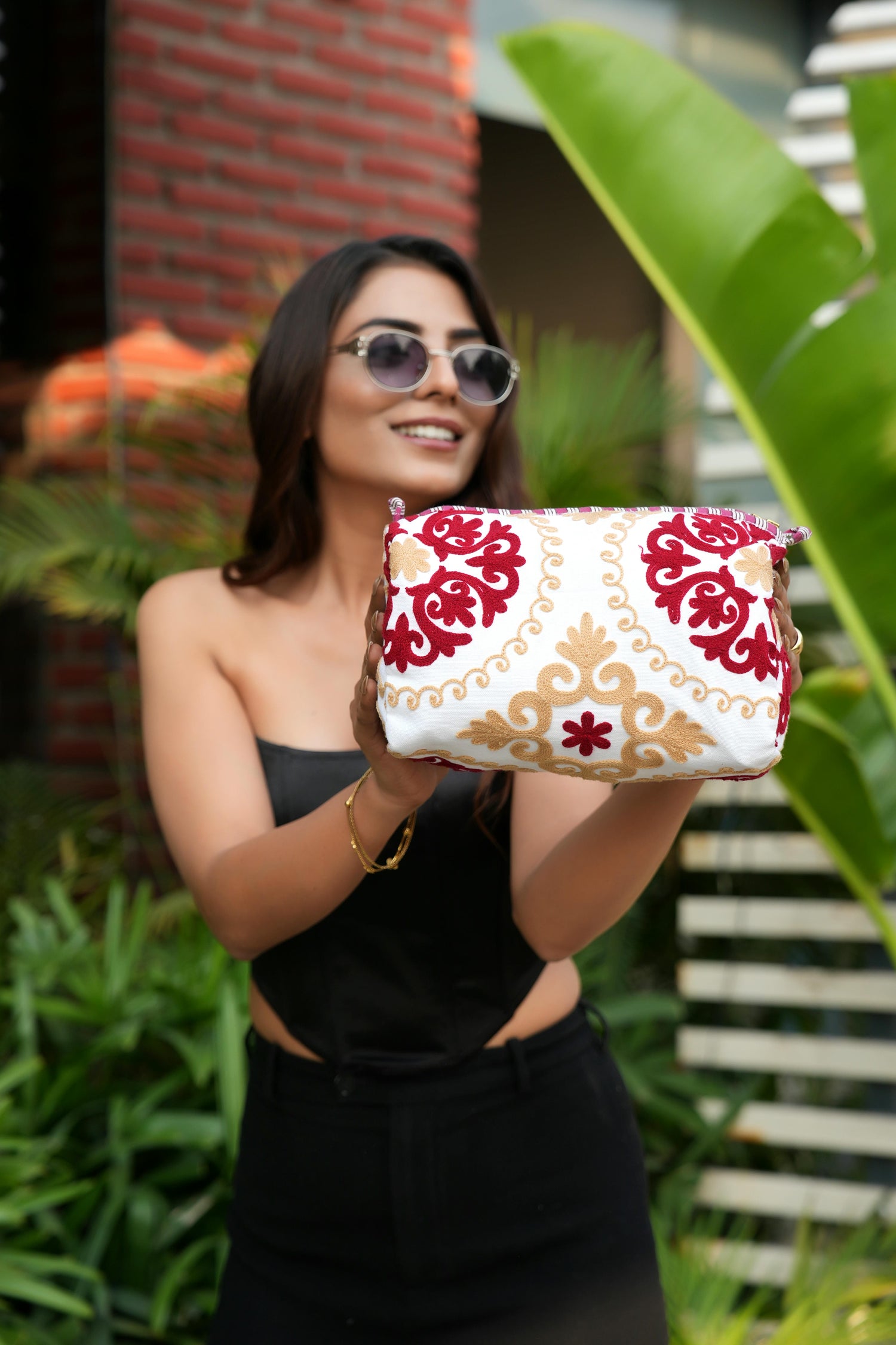 The Suzani Three Piece Travel Set — handmade, ethically made cotton travel pouch set in heritage Suzani print, hand-block-printed by makers in Rajasthan, India.