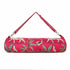 Front view of The Jungle Yoga Bag in cream cotton with the jungle print including parrots and palms
