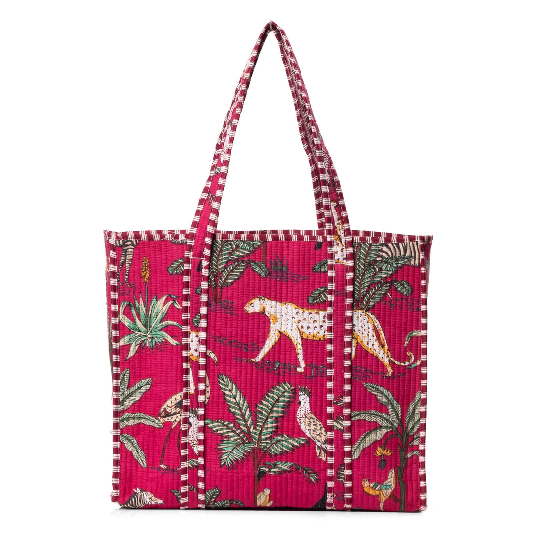Front view of The Jungle Tote in cream cotton with hand-block-printed parrots, palms, and tropical foliage in saturated colour