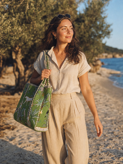 Cliffside village portrait with the Leopard Tote — hand-block-printed cotton from Conscious Yoga Collective, Italian Riviera holiday