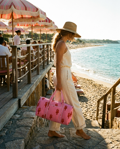 Golden hour stone beach steps descent with the Lobster Weekender in Pink hand-carried — handmade in Rajasthan by Conscious Yoga Collective