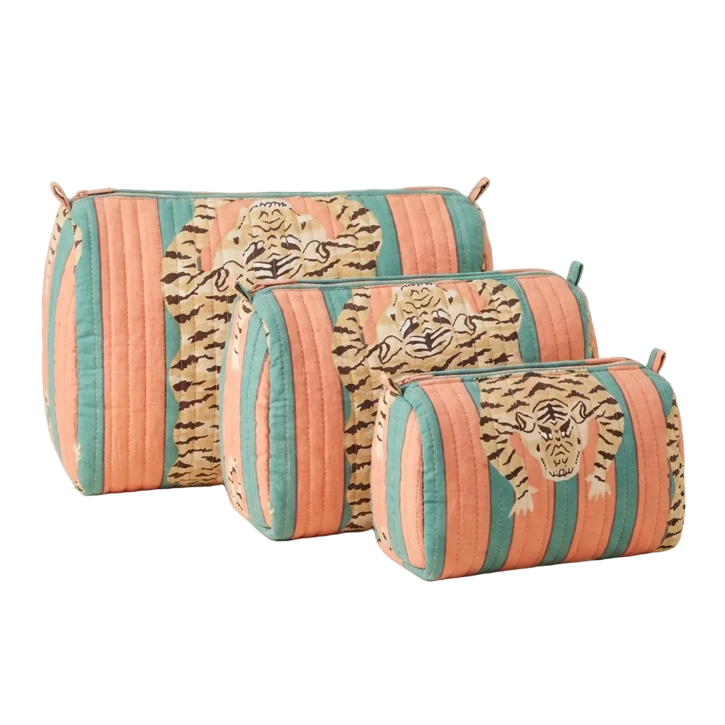 Tibetan Tiger 3 Piece Travel Set in peach and teal cotton, handmade and ethically made in Rajasthan, travel pouch set in three sizes on a white backdrop.