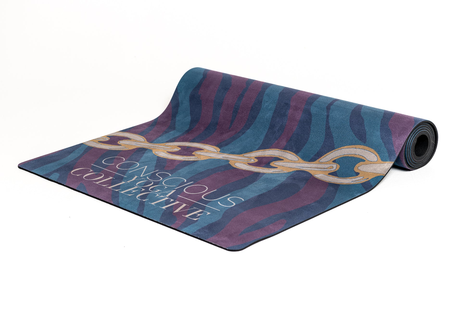yoga mat with gold navy green maroon zebra print rolled