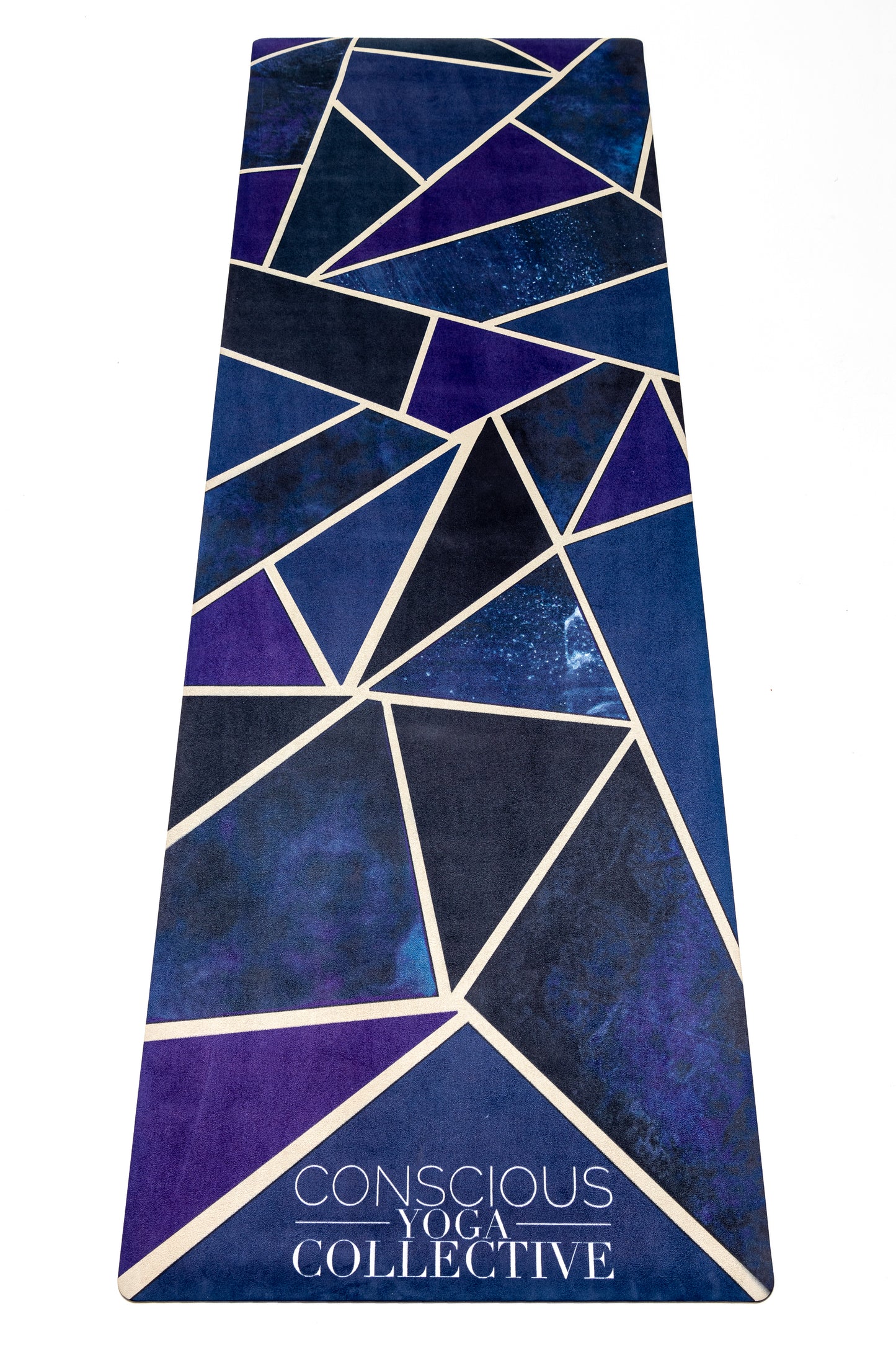conscious yoga collective yoga mat with broken glass geometric print in navy, black and purple with gold trim